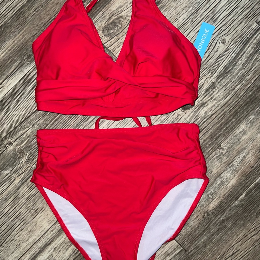 New Yonique two piece bathing suit bikini in a size medium.